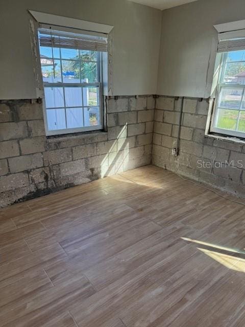 spare room with light wood-type flooring