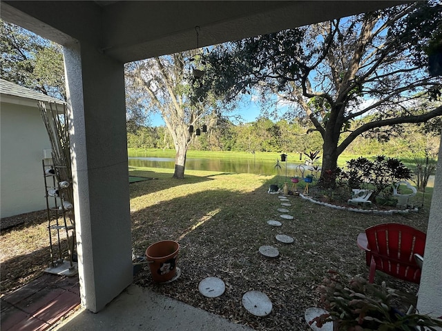 view of yard with a water view