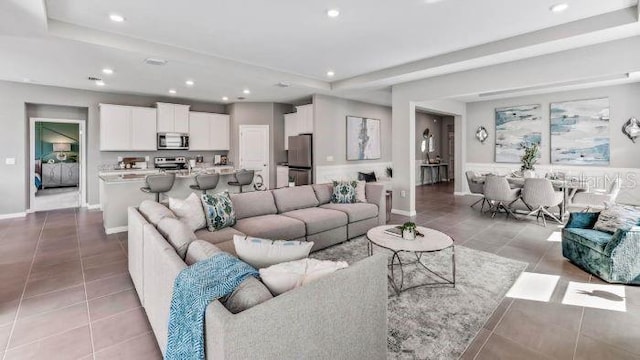 living room featuring light tile patterned floors