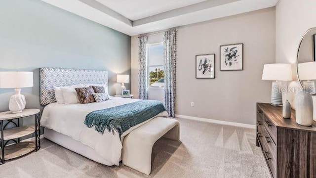 bedroom featuring light colored carpet