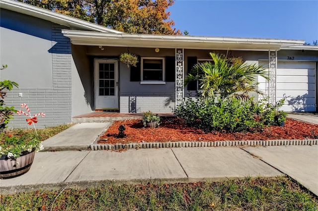 entrance to property with a garage