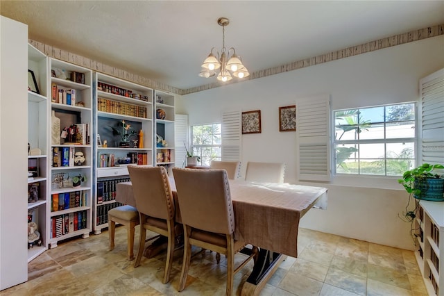 dining room with a chandelier