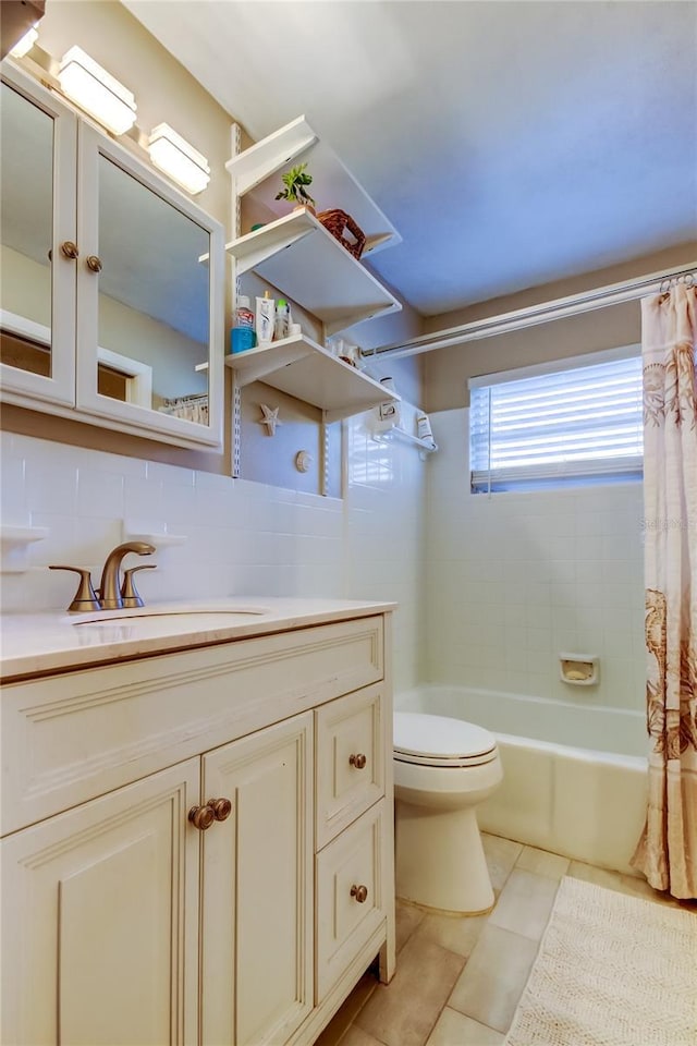 full bathroom featuring shower / bath combo, tile patterned flooring, backsplash, toilet, and vanity