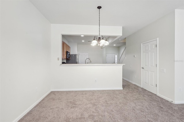 interior space with a notable chandelier and sink