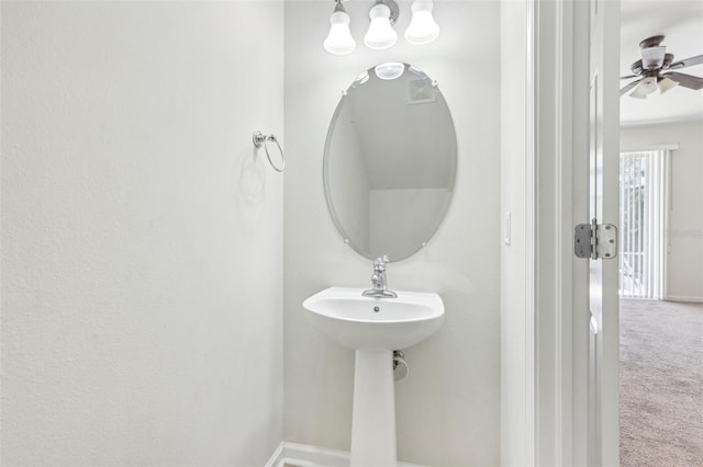 bathroom featuring ceiling fan