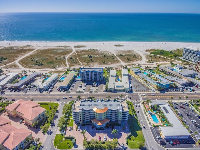 drone / aerial view with a view of the beach and a water view