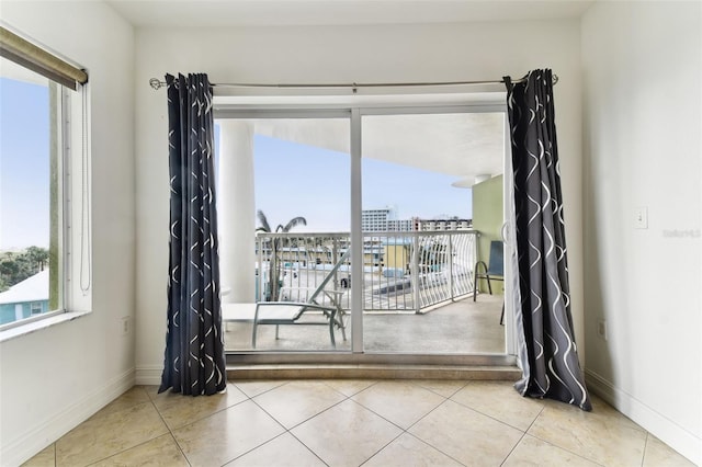 11605 Gulf Blvd Unit 507, Treasure Island, FL 33706 - tiled empty room with baseboards