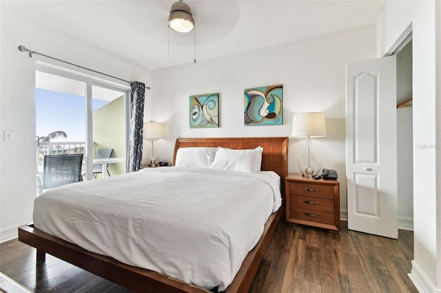 bedroom featuring access to exterior, dark hardwood / wood-style flooring, and ceiling fan