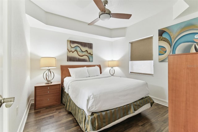 11605 Gulf Blvd Unit 507, Treasure Island, FL 33706 - bedroom featuring wood finished floors, baseboards, and ceiling fan