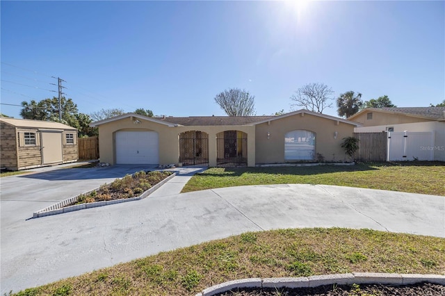 ranch-style house featuring a garage and a front lawn