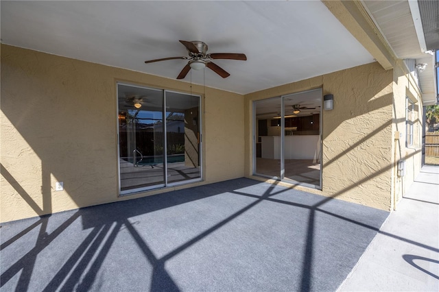 view of patio with ceiling fan