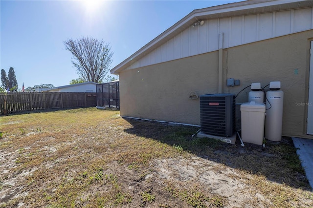 view of yard with central air condition unit