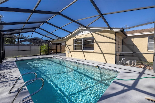 view of pool featuring a patio area and a lanai