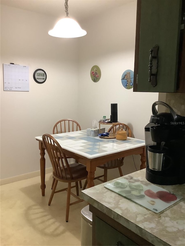 view of carpeted dining space