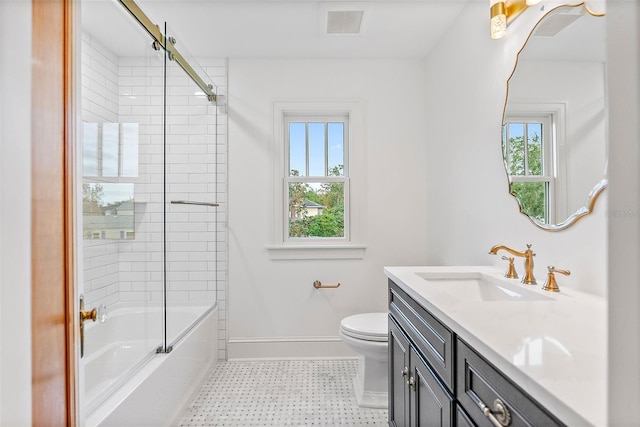 full bathroom with vanity, combined bath / shower with glass door, and toilet