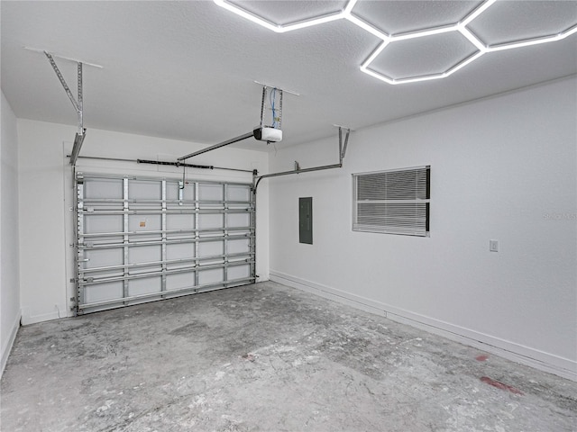 garage featuring electric panel and a garage door opener