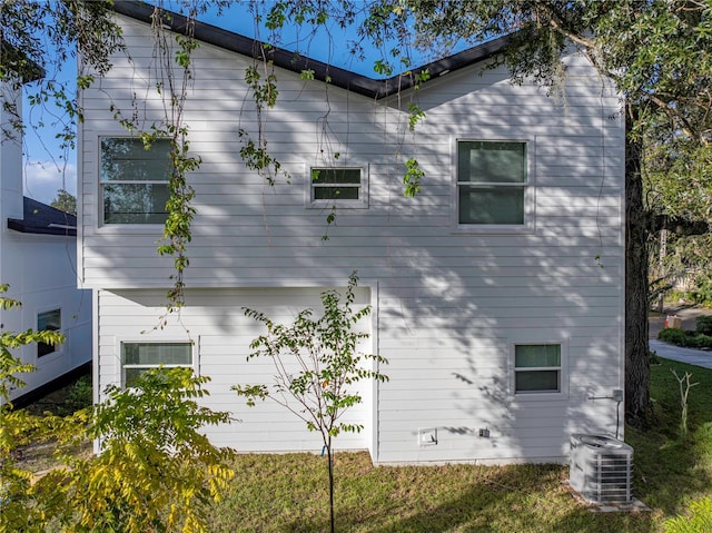 view of property exterior featuring central AC