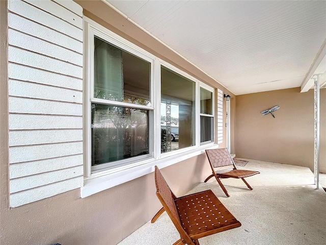 balcony featuring a porch