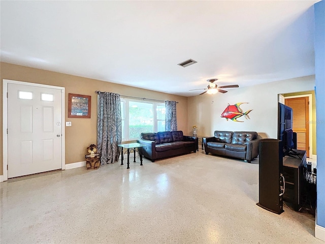 living room featuring ceiling fan