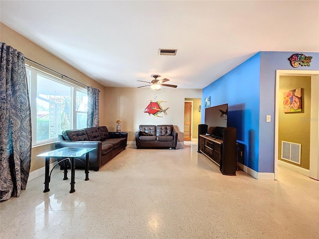 living room featuring ceiling fan