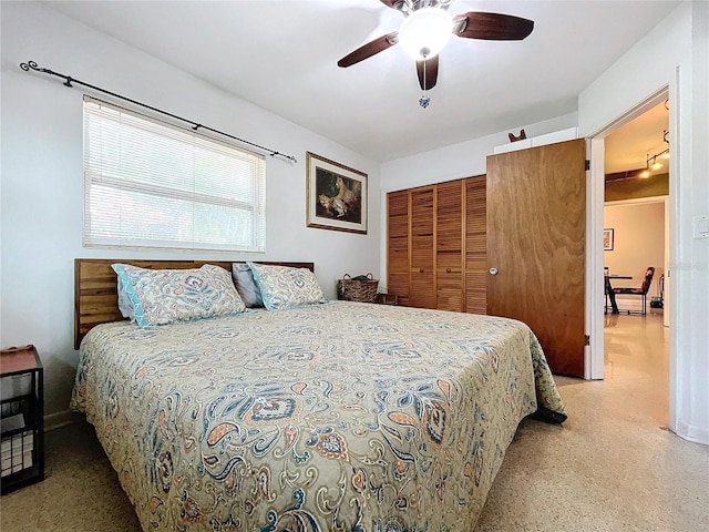 bedroom featuring a closet and ceiling fan