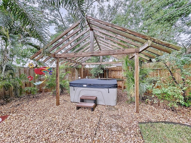 exterior space featuring a hot tub