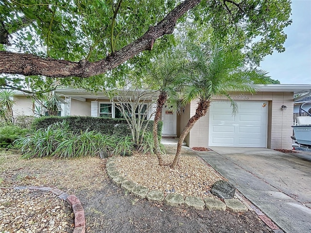 single story home featuring a garage