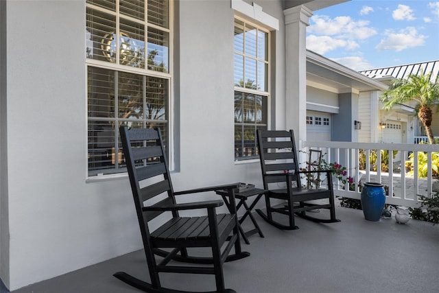 balcony featuring a porch