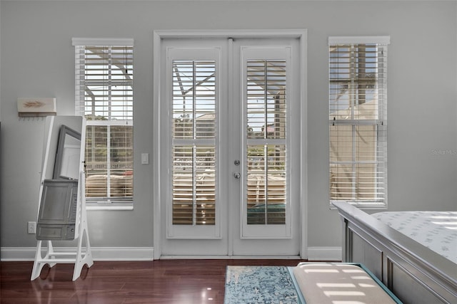 entryway featuring french doors and dark hardwood / wood-style floors