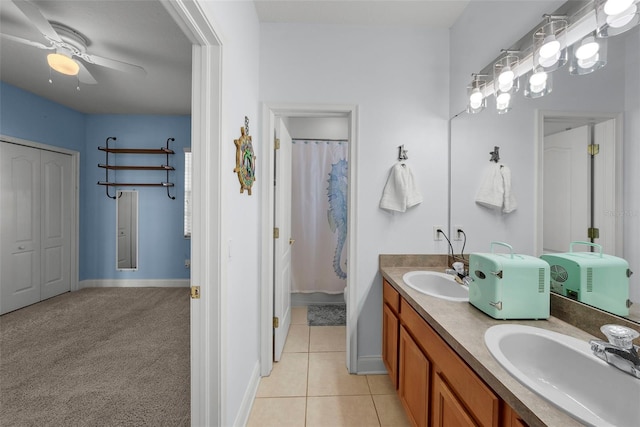 bathroom featuring vanity, tile patterned floors, and ceiling fan