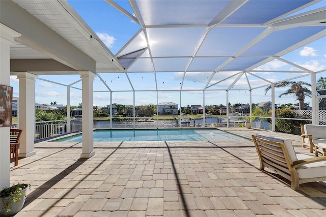 view of pool featuring a patio and a lanai