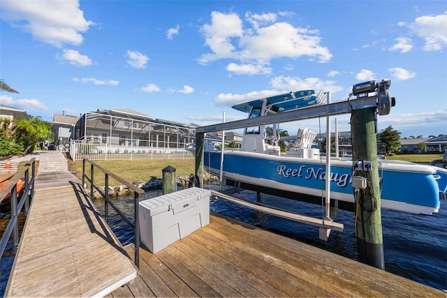 dock area featuring a water view and a lanai