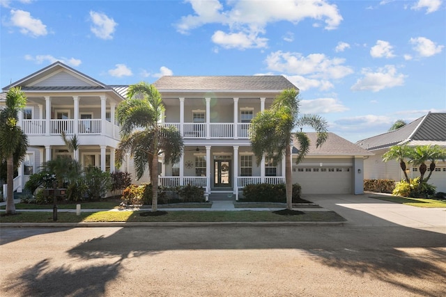 view of front of property featuring a garage and covered porch