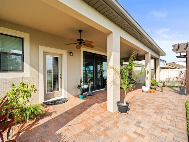 view of patio with ceiling fan