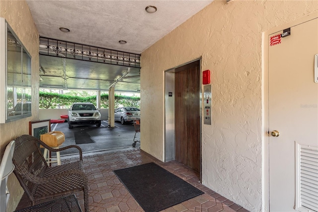 206 Tarpon Pt, Tarpon Springs, FL 34689 - hallway featuring elevator
