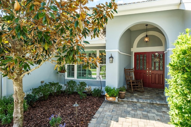 view of exterior entry with french doors