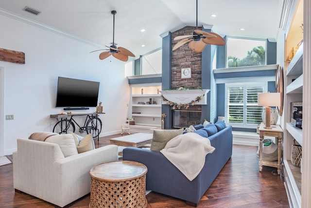 living room featuring ceiling fan, crown molding, lofted ceiling, and dark wood-type flooring