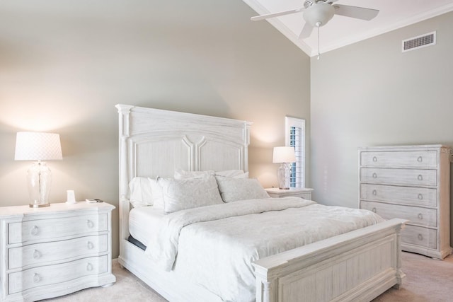 bedroom with light carpet, crown molding, ceiling fan, and high vaulted ceiling