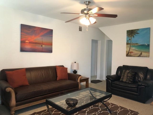 living room with carpet and ceiling fan