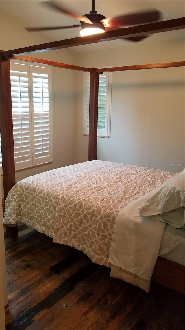 bedroom featuring hardwood / wood-style floors and ceiling fan