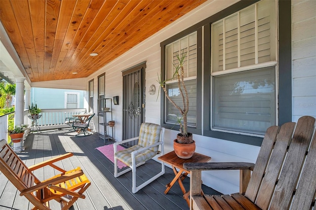 wooden deck featuring a porch