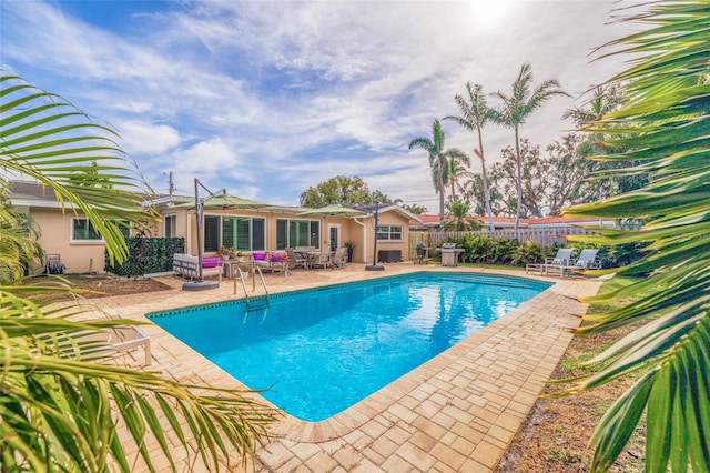 view of pool with a patio area