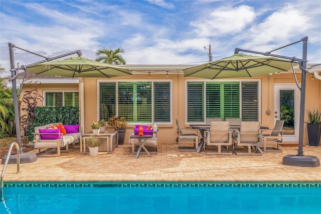 back of house featuring a patio