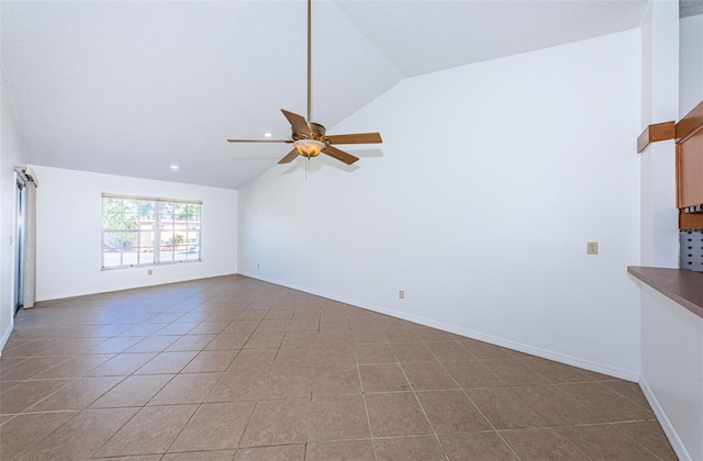 unfurnished living room with tile patterned floors, ceiling fan, and lofted ceiling