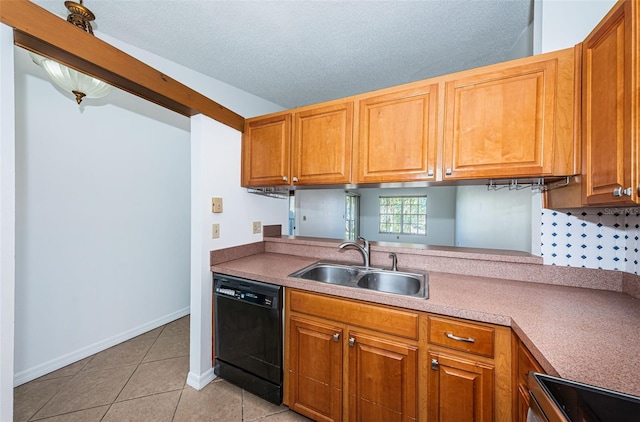 kitchen featuring stove, sink, a textured ceiling, black dishwasher, and light tile patterned flooring