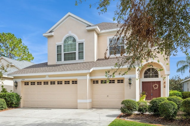 view of front of property with a garage