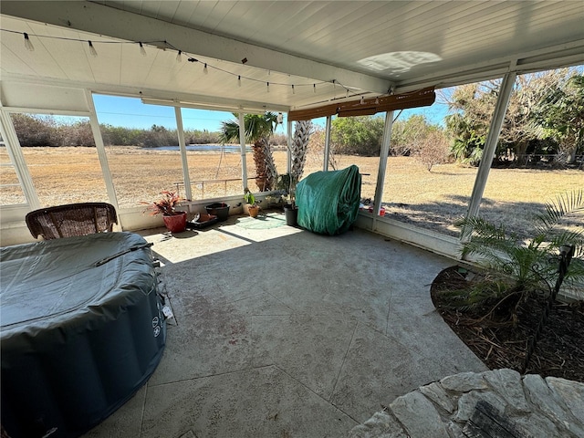 sunroom with a rural view