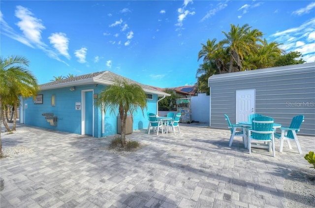 3960 Headsail Dr, New Port Richey, FL 34652 - view of patio / terrace featuring outdoor dining space