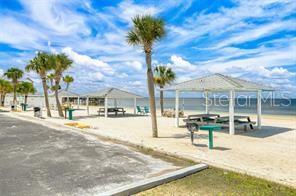 3960 Headsail Dr, New Port Richey, FL 34652 - view of community with a gazebo and a water view