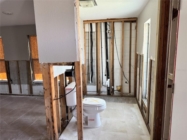 3960 Headsail Dr, New Port Richey, FL 34652 - bathroom featuring toilet and tile patterned floors